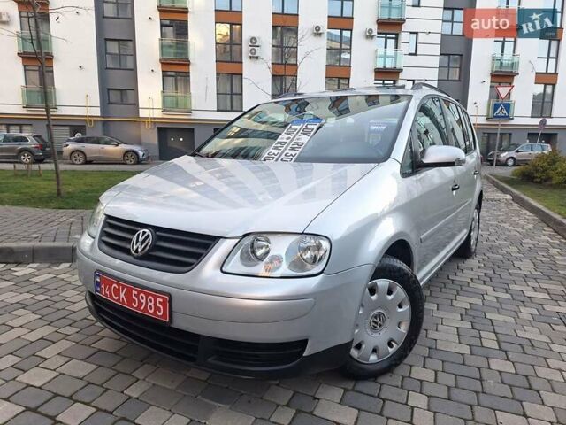 Серый Фольксваген Туран, объемом двигателя 1.6 л и пробегом 214 тыс. км за 6299 $, фото 2 на Automoto.ua