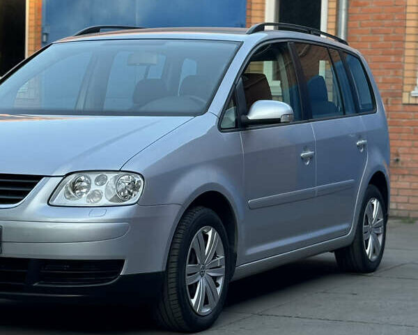 Сірий Фольксваген Туран, об'ємом двигуна 1.6 л та пробігом 219 тис. км за 6699 $, фото 11 на Automoto.ua