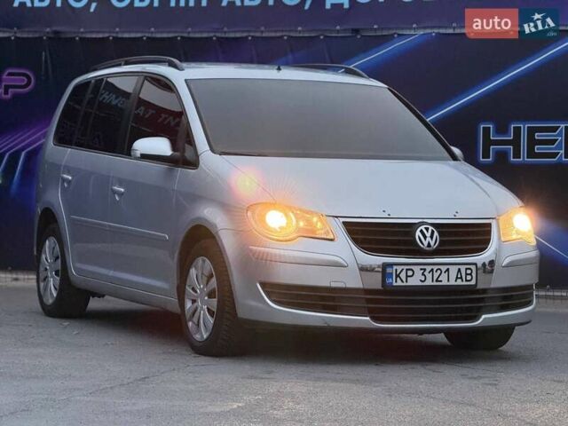 Серый Фольксваген Туран, объемом двигателя 1.39 л и пробегом 211 тыс. км за 6799 $, фото 3 на Automoto.ua
