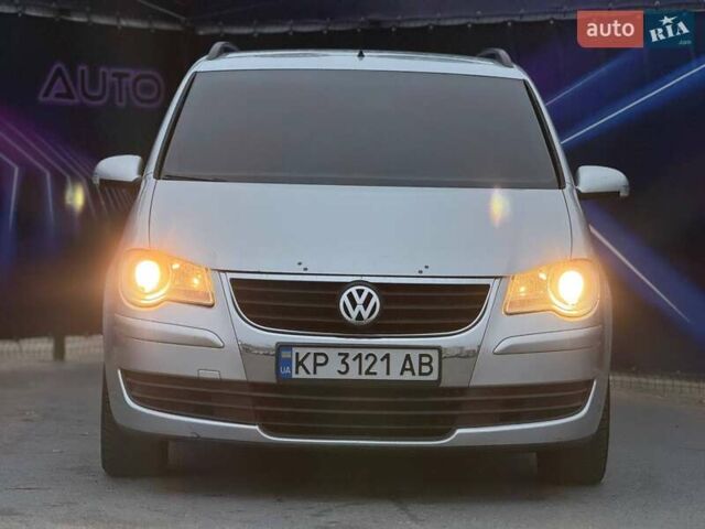 Серый Фольксваген Туран, объемом двигателя 1.39 л и пробегом 211 тыс. км за 6799 $, фото 2 на Automoto.ua