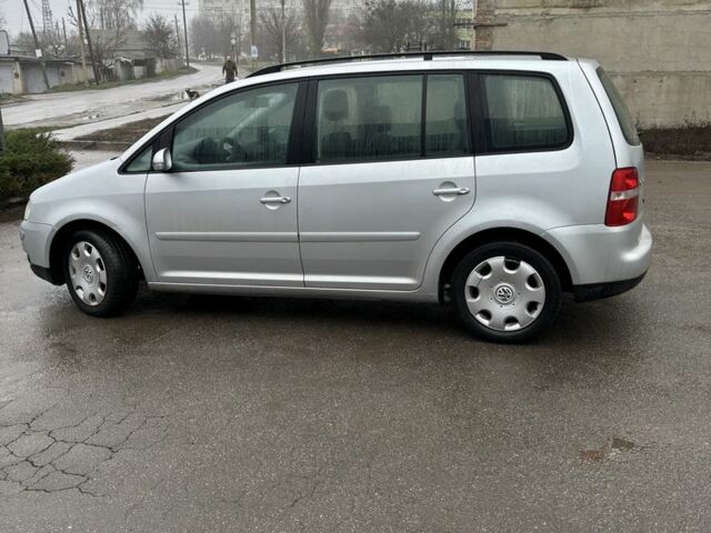 Серый Фольксваген Туран, объемом двигателя 1.9 л и пробегом 350 тыс. км за 2900 $, фото 6 на Automoto.ua