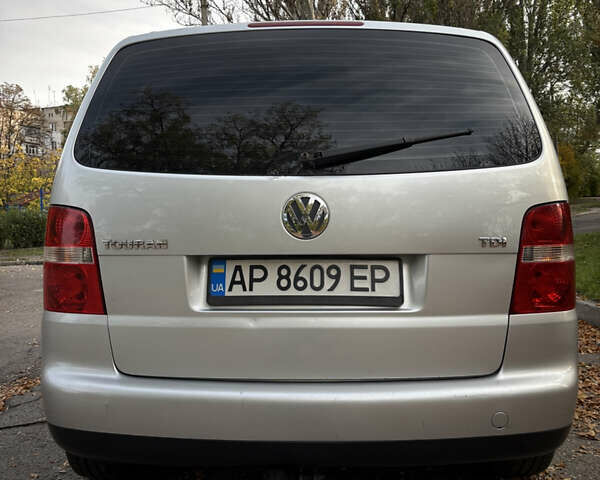 Серый Фольксваген Туран, объемом двигателя 1.9 л и пробегом 206 тыс. км за 6800 $, фото 2 на Automoto.ua