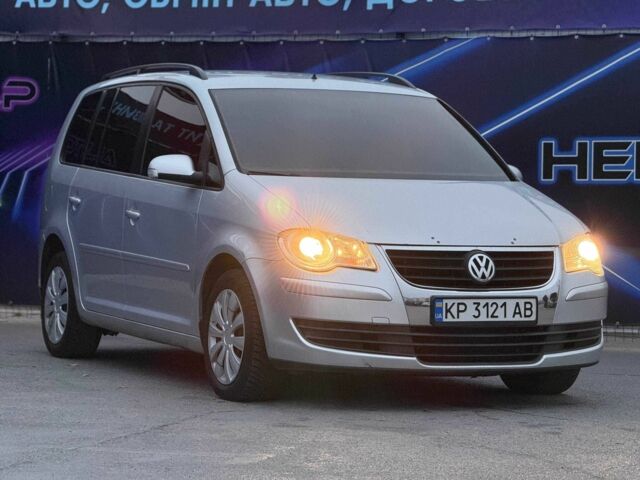 Сірий Фольксваген Туран, об'ємом двигуна 1.4 л та пробігом 211 тис. км за 6799 $, фото 3 на Automoto.ua