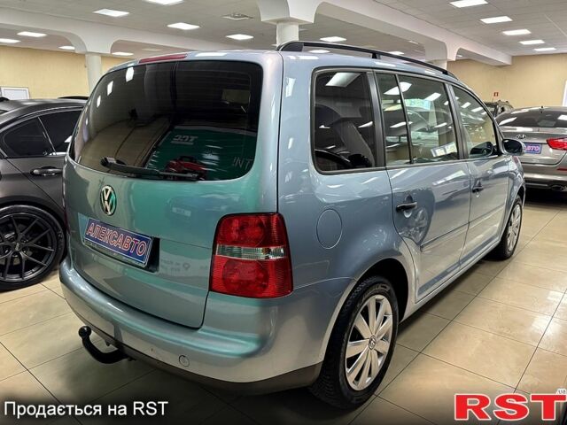 Серый Фольксваген Туран, объемом двигателя 1.6 л и пробегом 213 тыс. км за 6600 $, фото 2 на Automoto.ua