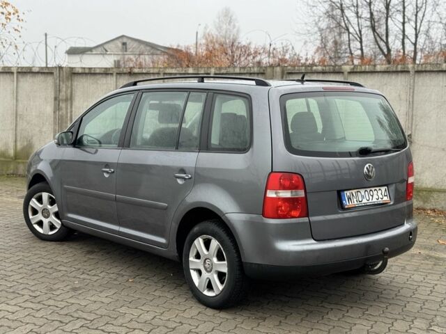 Серый Фольксваген Туран, объемом двигателя 2 л и пробегом 370 тыс. км за 2550 $, фото 5 на Automoto.ua