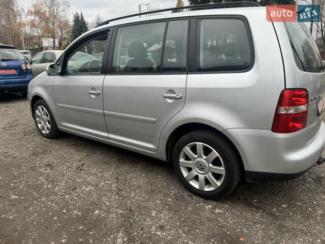 Сірий Фольксваген Туран, об'ємом двигуна 1.6 л та пробігом 221 тис. км за 6499 $, фото 4 на Automoto.ua