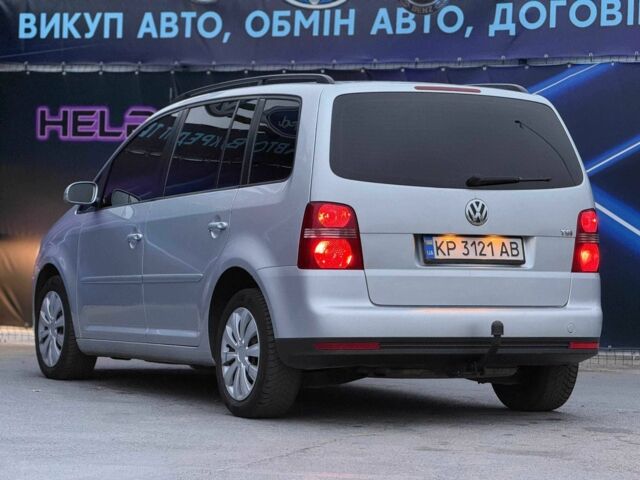 Сірий Фольксваген Туран, об'ємом двигуна 1.4 л та пробігом 211 тис. км за 6799 $, фото 4 на Automoto.ua