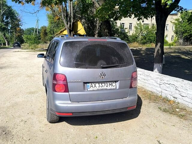 Сірий Фольксваген Туран, об'ємом двигуна 1.4 л та пробігом 208 тис. км за 4200 $, фото 4 на Automoto.ua