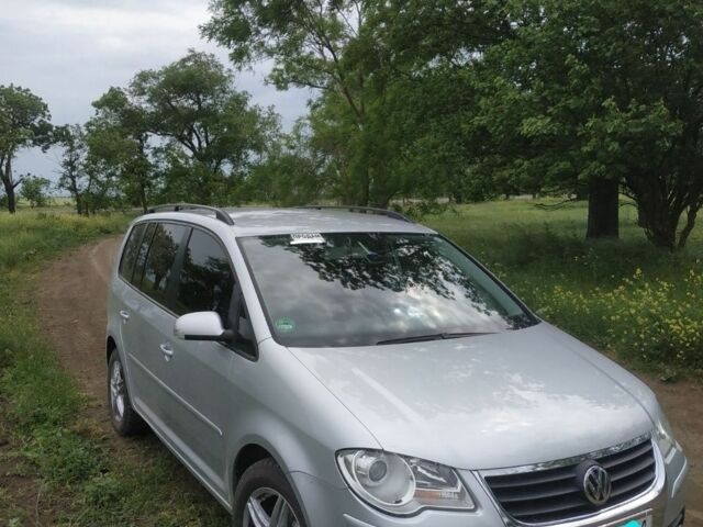 Серый Фольксваген Туран, объемом двигателя 1.4 л и пробегом 216 тыс. км за 6600 $, фото 7 на Automoto.ua