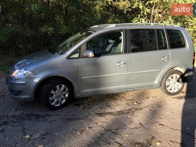 Серый Фольксваген Туран, объемом двигателя 1.4 л и пробегом 268 тыс. км за 6200 $, фото 2 на Automoto.ua
