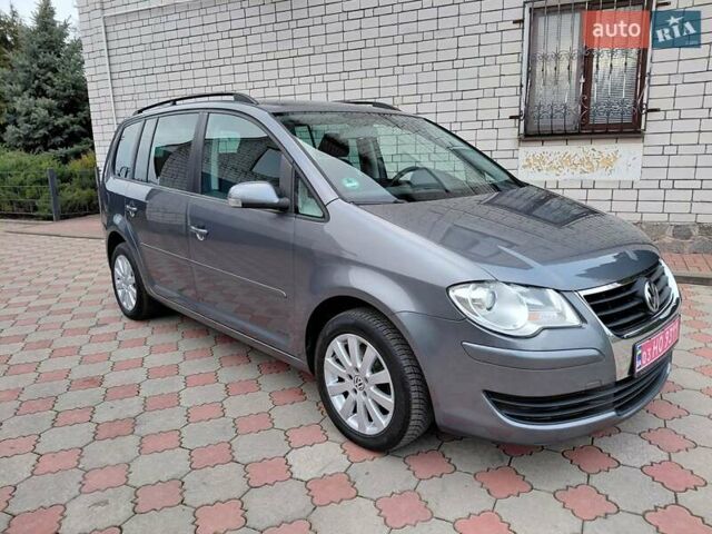 Серый Фольксваген Туран, объемом двигателя 1.6 л и пробегом 196 тыс. км за 7499 $, фото 2 на Automoto.ua