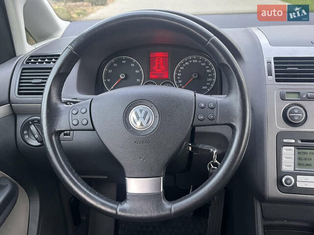 Сірий Фольксваген Туран, об'ємом двигуна 1.4 л та пробігом 48 тис. км за 8999 $, фото 34 на Automoto.ua
