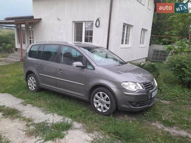 Сірий Фольксваген Туран, об'ємом двигуна 1.4 л та пробігом 250 тис. км за 6500 $, фото 1 на Automoto.ua