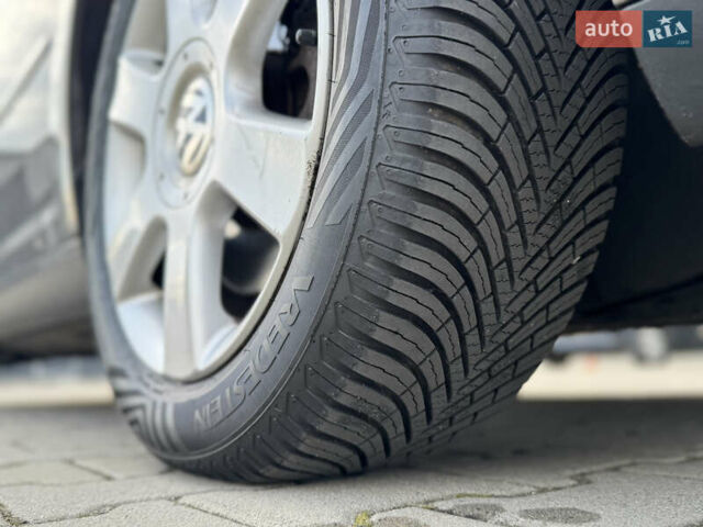 Серый Фольксваген Туран, объемом двигателя 1.4 л и пробегом 210 тыс. км за 5899 $, фото 28 на Automoto.ua