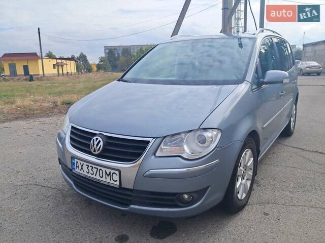 Серый Фольксваген Туран, объемом двигателя 1.4 л и пробегом 209 тыс. км за 6500 $, фото 6 на Automoto.ua