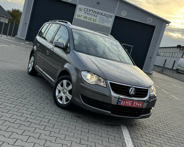 Серый Фольксваген Туран, объемом двигателя 1.4 л и пробегом 210 тыс. км за 5899 $, фото 2 на Automoto.ua