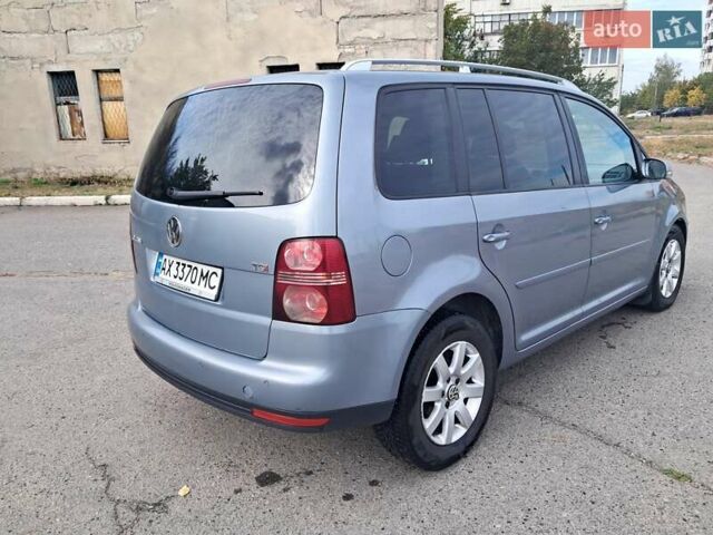 Серый Фольксваген Туран, объемом двигателя 1.4 л и пробегом 209 тыс. км за 6500 $, фото 4 на Automoto.ua
