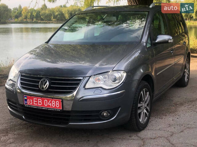 Сірий Фольксваген Туран, об'ємом двигуна 2 л та пробігом 254 тис. км за 7100 $, фото 2 на Automoto.ua