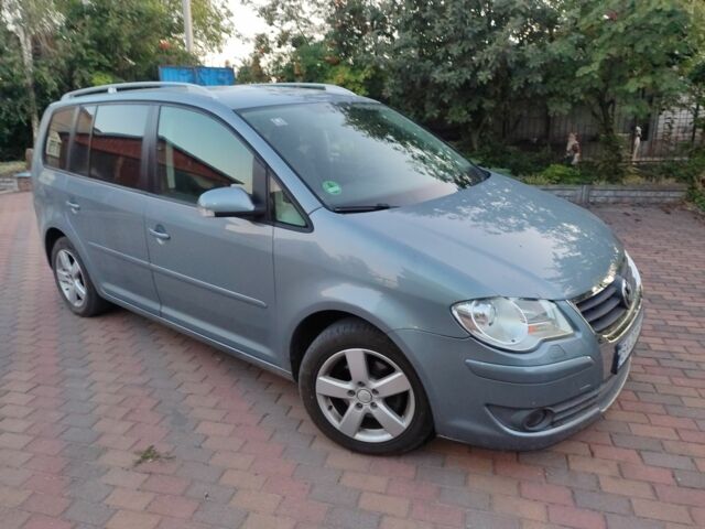 Серый Фольксваген Туран, объемом двигателя 1.4 л и пробегом 246 тыс. км за 6900 $, фото 5 на Automoto.ua