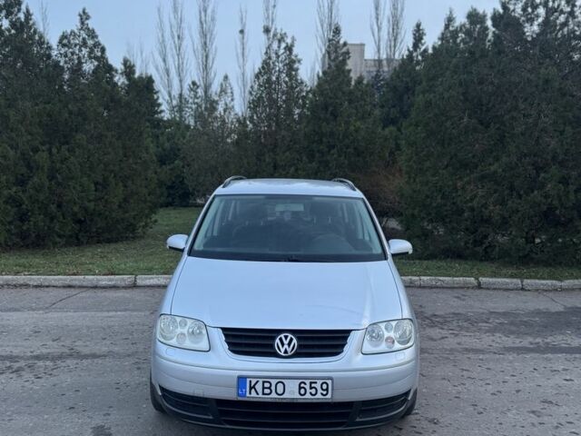 Серый Фольксваген Туран, объемом двигателя 1.9 л и пробегом 250 тыс. км за 3450 $, фото 2 на Automoto.ua