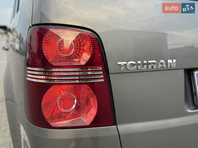 Серый Фольксваген Туран, объемом двигателя 1.4 л и пробегом 210 тыс. км за 5899 $, фото 38 на Automoto.ua