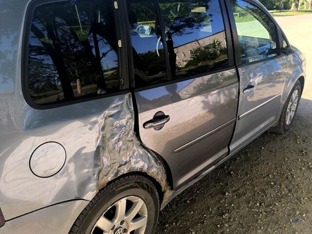 Сірий Фольксваген Туран, об'ємом двигуна 1.4 л та пробігом 208 тис. км за 4200 $, фото 1 на Automoto.ua