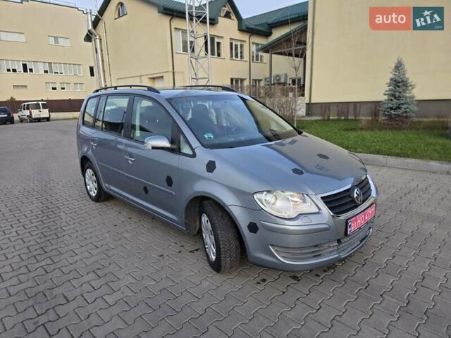 Сірий Фольксваген Туран, об'ємом двигуна 1.4 л та пробігом 215 тис. км за 5550 $, фото 1 на Automoto.ua