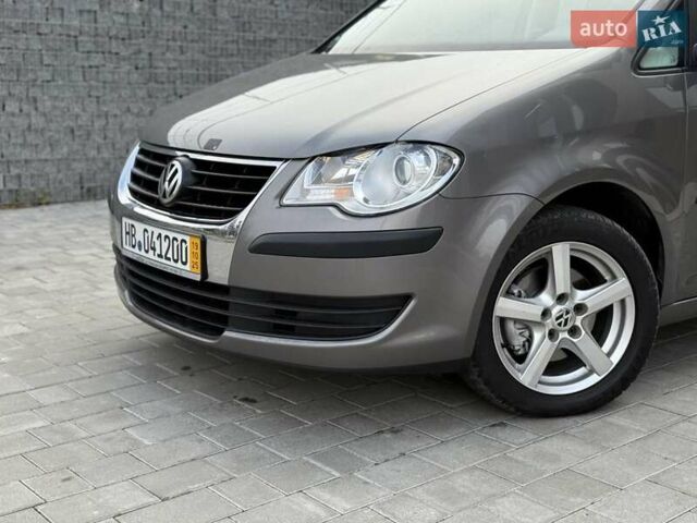 Сірий Фольксваген Туран, об'ємом двигуна 1.4 л та пробігом 187 тис. км за 6650 $, фото 4 на Automoto.ua