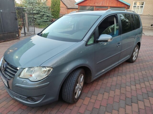 Серый Фольксваген Туран, объемом двигателя 1.4 л и пробегом 246 тыс. км за 6900 $, фото 3 на Automoto.ua