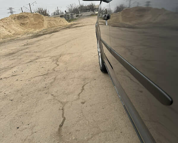 Сірий Фольксваген Туран, об'ємом двигуна 1.4 л та пробігом 185 тис. км за 7500 $, фото 5 на Automoto.ua