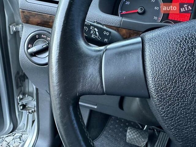 Серый Фольксваген Туран, объемом двигателя 1.4 л и пробегом 142 тыс. км за 8650 $, фото 50 на Automoto.ua