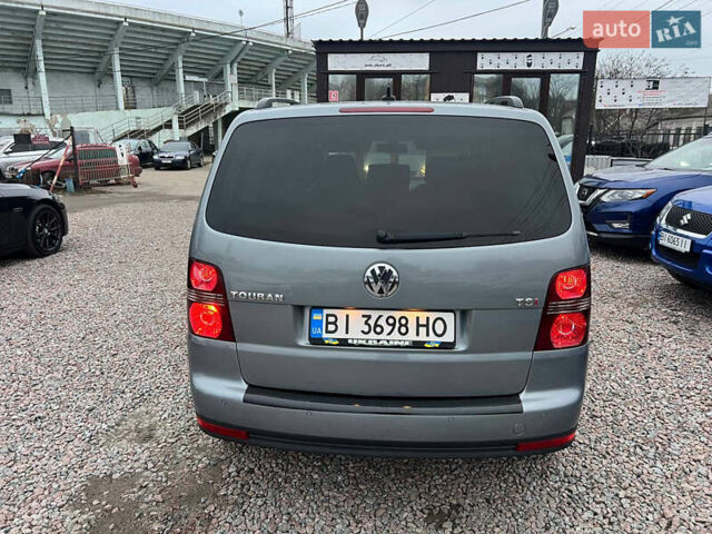 Серый Фольксваген Туран, объемом двигателя 1.4 л и пробегом 189 тыс. км за 7700 $, фото 4 на Automoto.ua