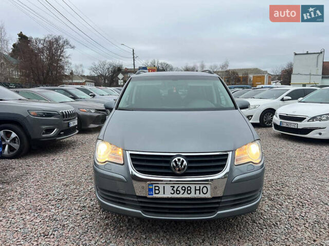 Серый Фольксваген Туран, объемом двигателя 1.4 л и пробегом 189 тыс. км за 7700 $, фото 1 на Automoto.ua