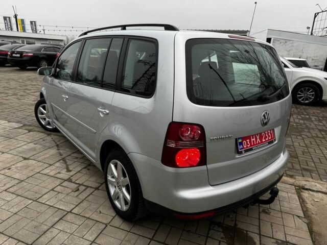 Серый Фольксваген Туран, объемом двигателя 1.4 л и пробегом 149 тыс. км за 7300 $, фото 2 на Automoto.ua