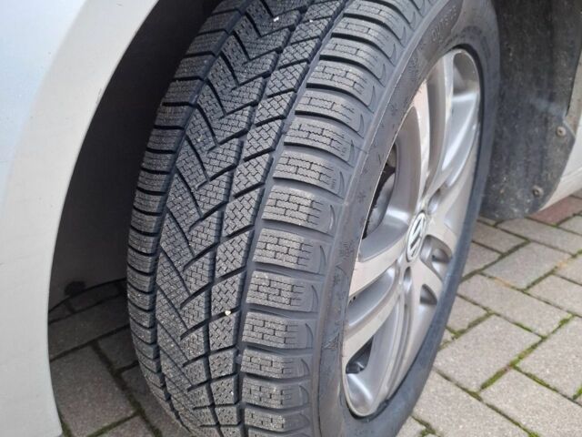 Сірий Фольксваген Туран, об'ємом двигуна 1.9 л та пробігом 224 тис. км за 8990 $, фото 2 на Automoto.ua