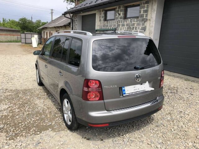 Сірий Фольксваген Туран, об'ємом двигуна 1.4 л та пробігом 240 тис. км за 5900 $, фото 1 на Automoto.ua