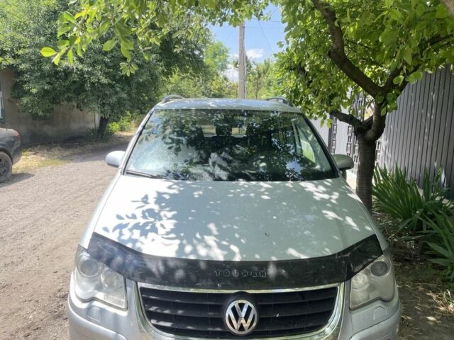 Серый Фольксваген Туран, объемом двигателя 2 л и пробегом 345 тыс. км за 5999 $, фото 1 на Automoto.ua