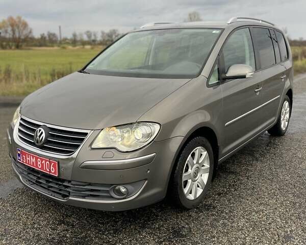 Сірий Фольксваген Туран, об'ємом двигуна 1.4 л та пробігом 205 тис. км за 6950 $, фото 4 на Automoto.ua