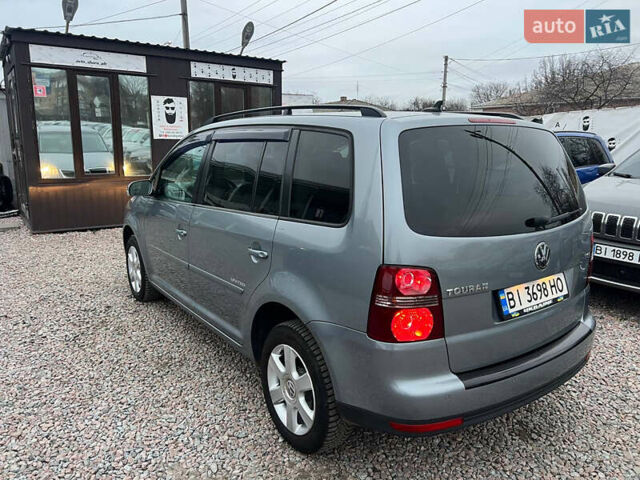 Серый Фольксваген Туран, объемом двигателя 1.4 л и пробегом 189 тыс. км за 7700 $, фото 5 на Automoto.ua