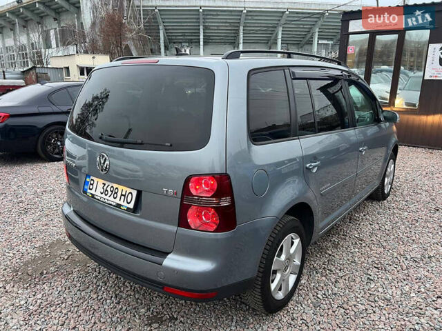 Серый Фольксваген Туран, объемом двигателя 1.4 л и пробегом 189 тыс. км за 7700 $, фото 3 на Automoto.ua