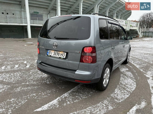 Сірий Фольксваген Туран, об'ємом двигуна 1.4 л та пробігом 189 тис. км за 7400 $, фото 6 на Automoto.ua