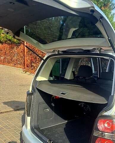 Серый Фольксваген Туран, объемом двигателя 1.4 л и пробегом 317 тыс. км за 7500 $, фото 6 на Automoto.ua