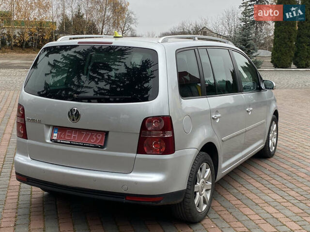 Сірий Фольксваген Туран, об'ємом двигуна 1.4 л та пробігом 187 тис. км за 7600 $, фото 4 на Automoto.ua