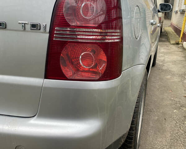 Серый Фольксваген Туран, объемом двигателя 1.98 л и пробегом 303 тыс. км за 7800 $, фото 5 на Automoto.ua