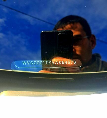 Серый Фольксваген Туран, объемом двигателя 1.4 л и пробегом 317 тыс. км за 7500 $, фото 2 на Automoto.ua