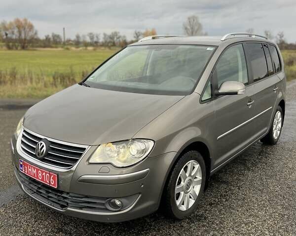 Сірий Фольксваген Туран, об'ємом двигуна 1.4 л та пробігом 205 тис. км за 6950 $, фото 1 на Automoto.ua