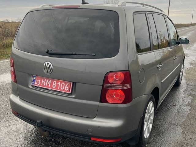 Серый Фольксваген Туран, объемом двигателя 1.4 л и пробегом 205 тыс. км за 6900 $, фото 4 на Automoto.ua