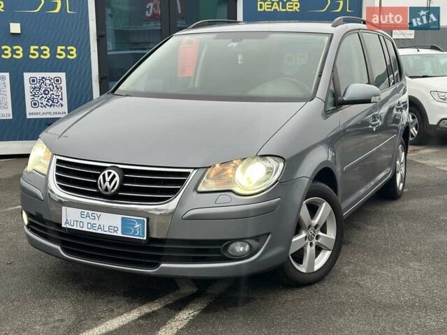 Серый Фольксваген Туран, объемом двигателя 1.39 л и пробегом 263 тыс. км за 6290 $, фото 1 на Automoto.ua