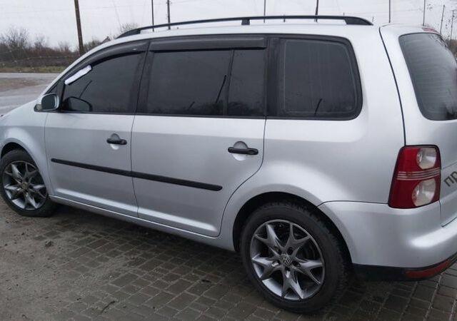 Сірий Фольксваген Туран, об'ємом двигуна 14 л та пробігом 299 тис. км за 7000 $, фото 1 на Automoto.ua