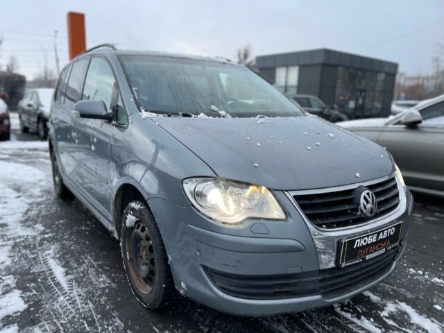 Серый Фольксваген Туран, объемом двигателя 1.9 л и пробегом 237 тыс. км за 6700 $, фото 1 на Automoto.ua